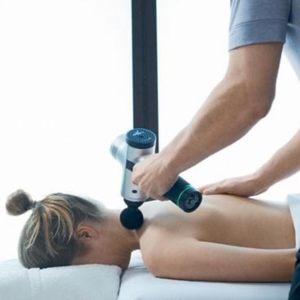 Patient massage with Powerbody Massage Gun for sale